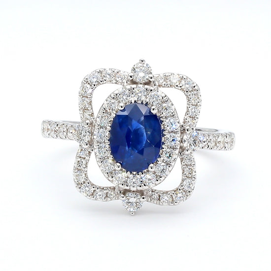 Natural Blue Oval Sapphire and Diamond 1.62 Carat TW Gold Ring