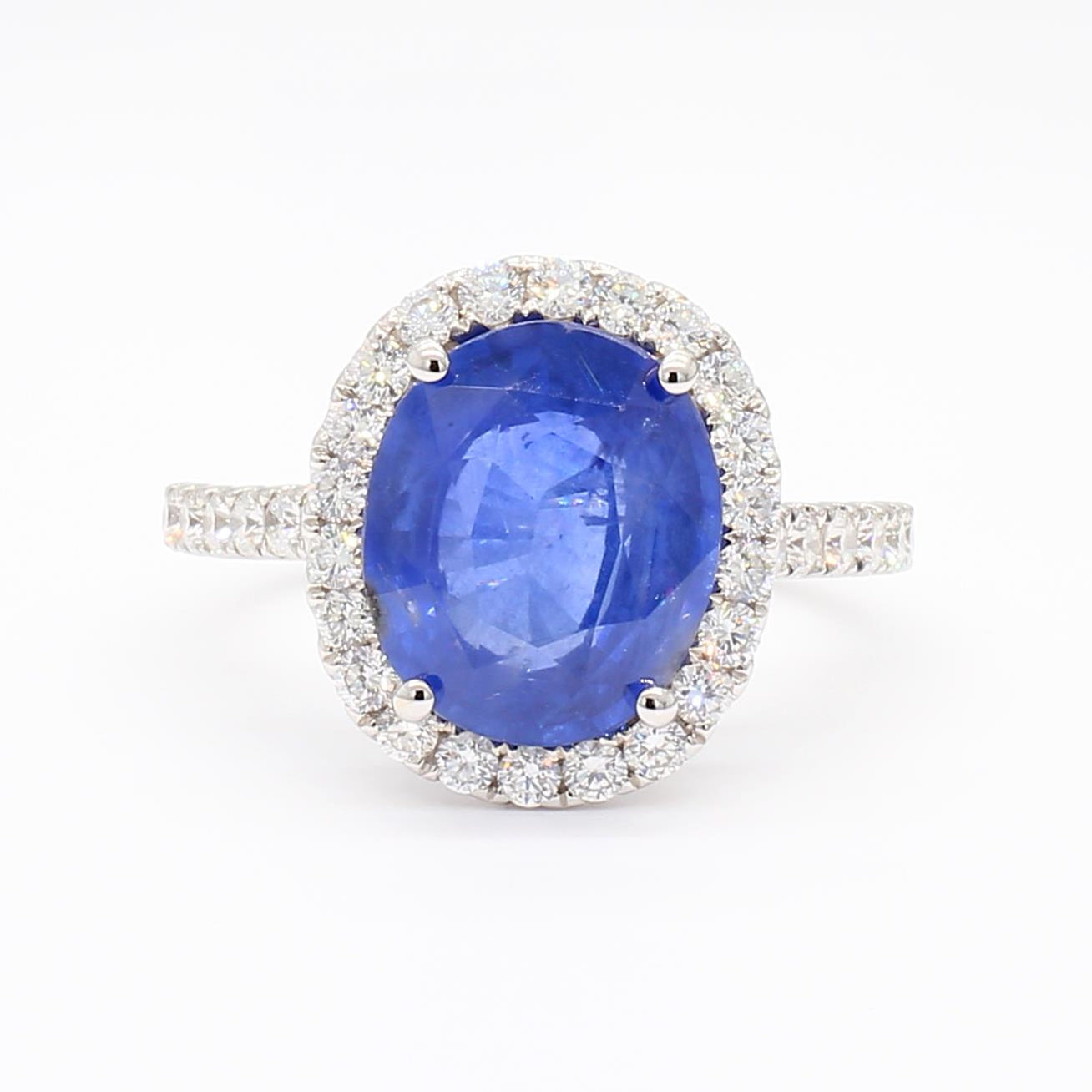 Natural Blue Oval Sapphire and White Diamond 4.78 Carat TW Gold Cocktail Ring