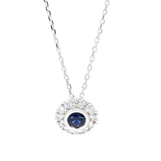 Natural Blue Round Sapphire and Diamond 0.57 Carat TW Gold Pendant