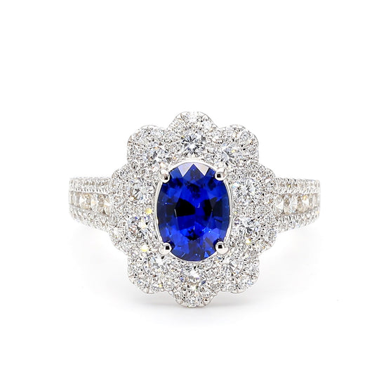 Natural Blue Oval Sapphire and White Diamond 2.44 Carat TW Gold Cocktail Ring