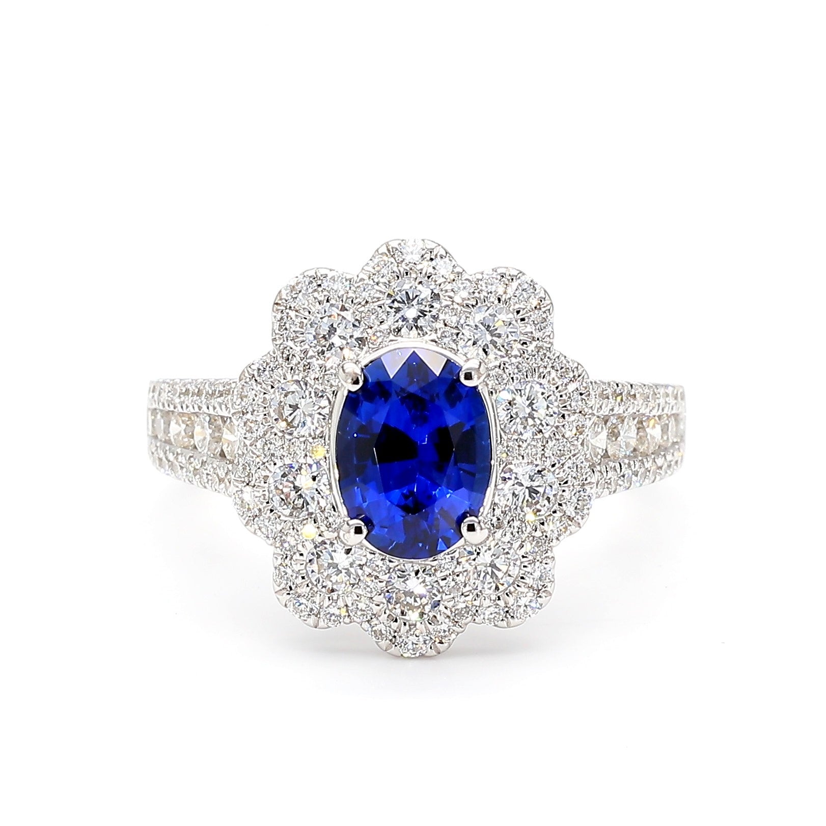 Natural Blue Oval Sapphire and White Diamond 2.44 Carat TW Gold Cocktail Ring