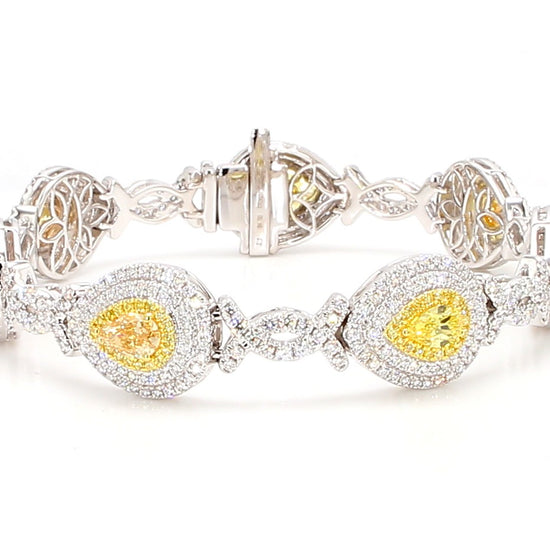 GIA Certified Vivid Yellow and Fancy Pink Diamond 6.75 Carat TW Gold Bracelet