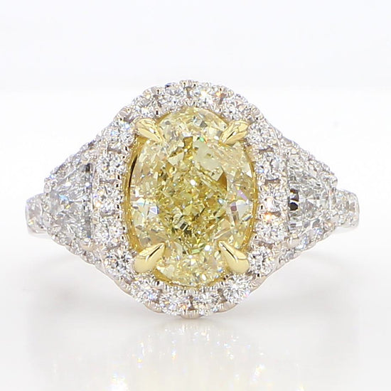 GIA Certified Natural Yellow Oval Diamond 4.06 Carat TW Gold Cocktail Ring