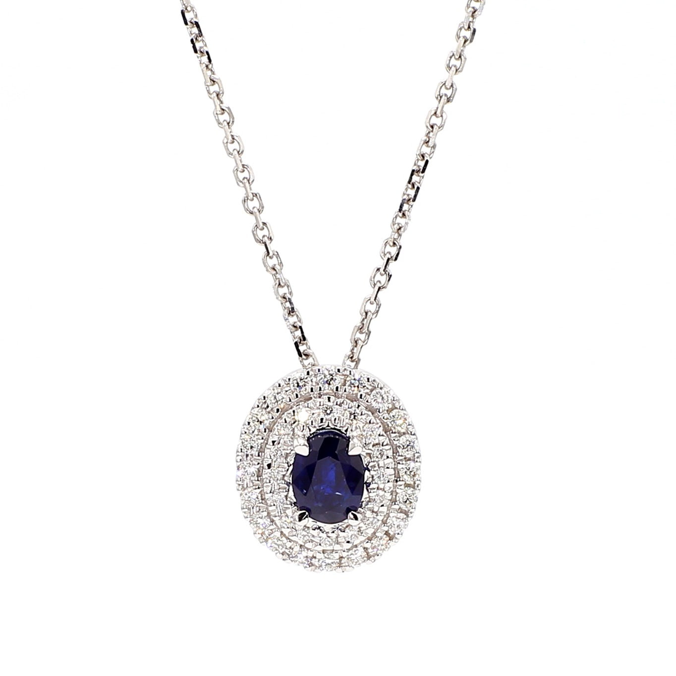 Natural Blue Oval Sapphire and White Diamond .67 Carat TW White Gold Pendant