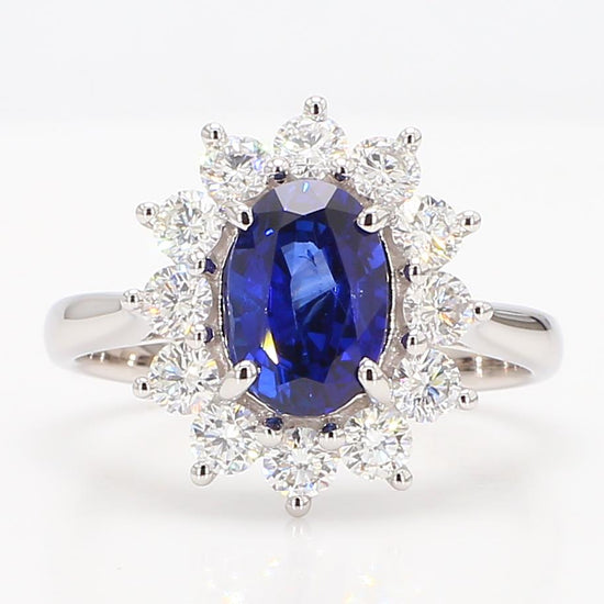 Natural Blue Oval Sapphire and White Diamond 2.88 Carat TW Gold Cocktail Ring