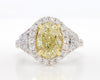 GIA Certified Natural Yellow Oval Diamond 4.06 Carat TW Gold Cocktail Ring